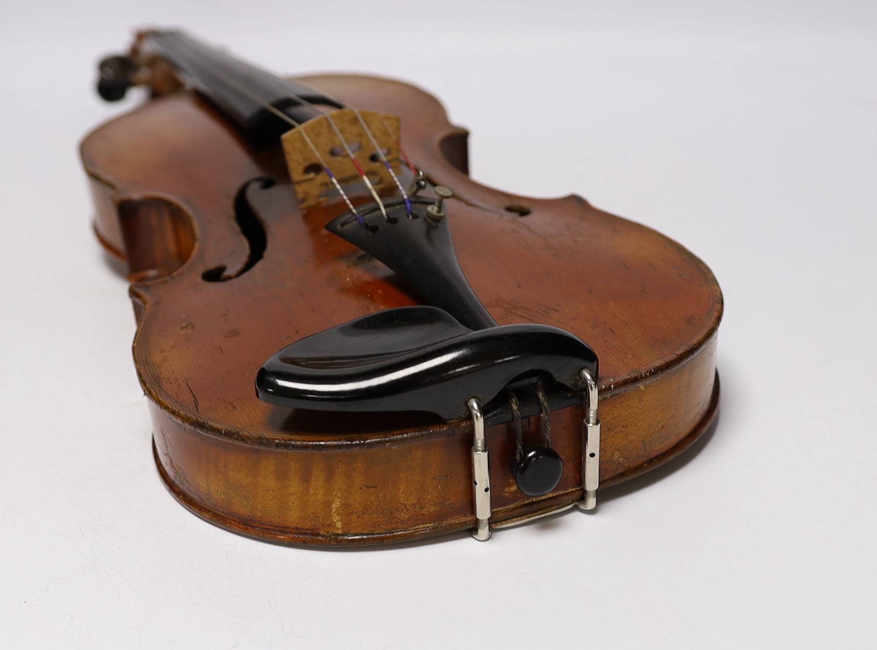 A cased late 19th/early 20th century French violin, bears Joseph Guarnerius label